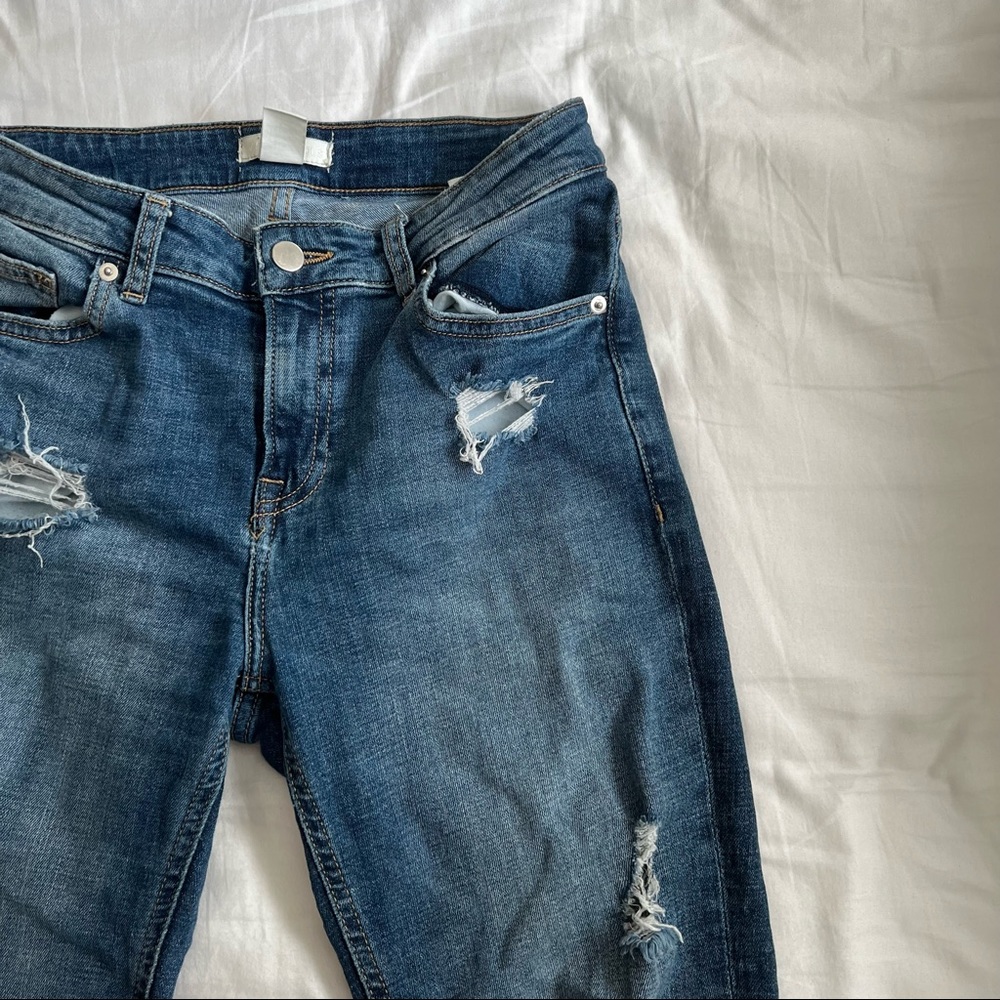 Distressed boyfriend jeans